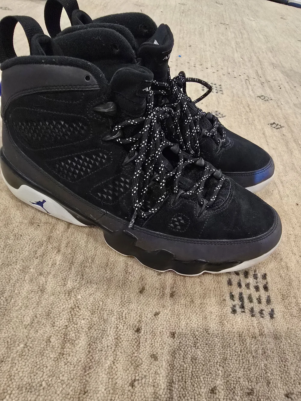 Air Jordan Black Suede High-Top Sneakers with Blue Accent